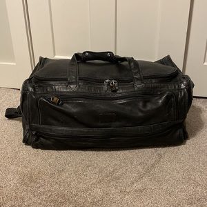 TUMI Black Leather Duffel Bag, 25” x 12” x 12”